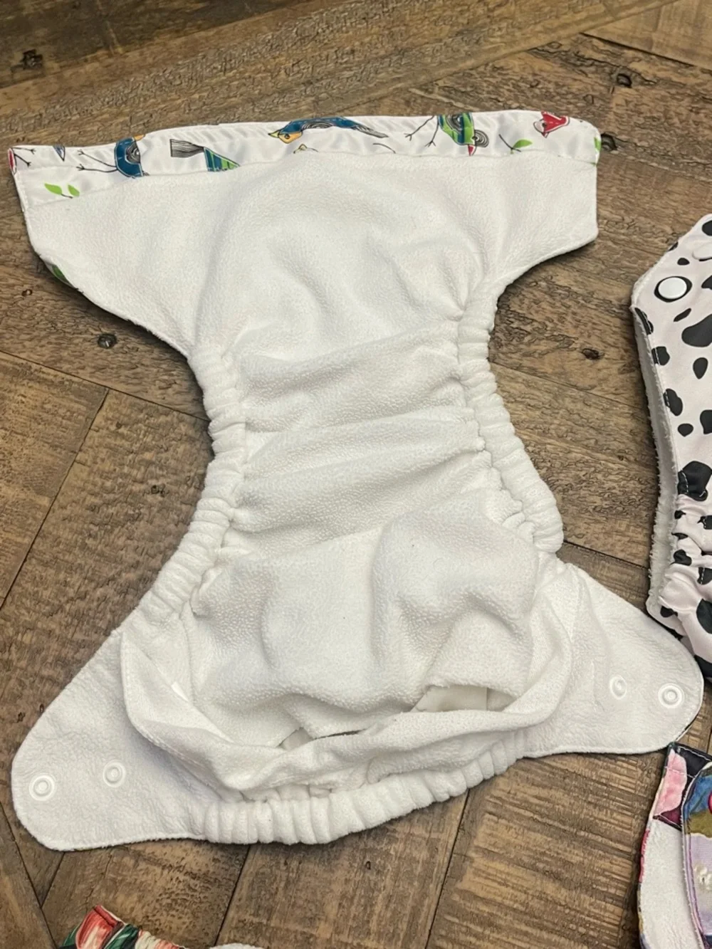 Sunbaby reusable cloth baby diapers with adjustable snaps to grow with baby